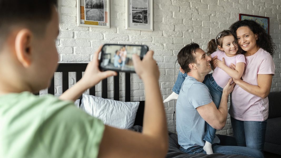 close-up-kid-taking-family-photos