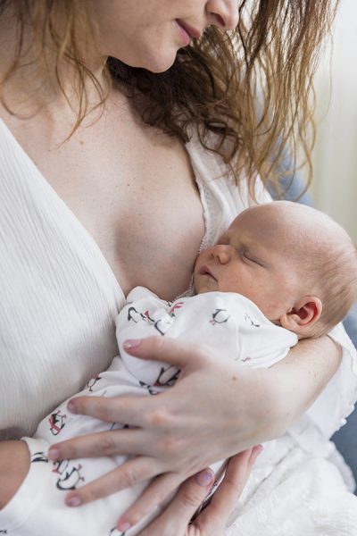 close-up-of-mother-with-baby-in-her-arm
