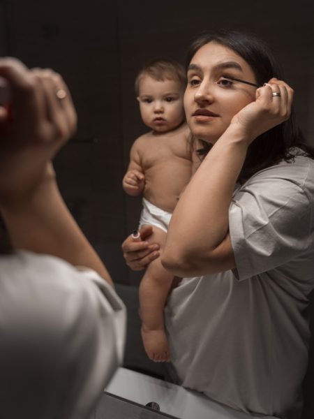 front-view-woman-with-baby-bathroom