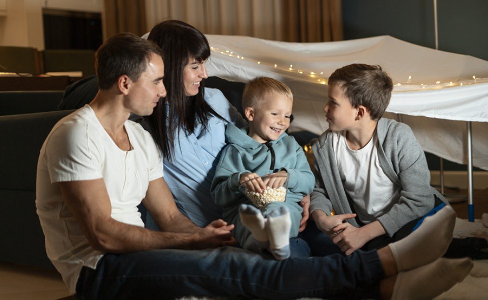 full-shot-family-members-sitting-together