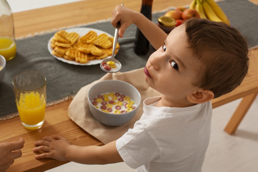 high-angle-little-kid-eating