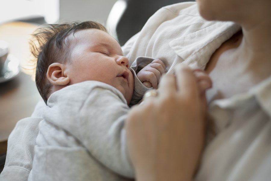 mom-gently-breast-feeding-her-child