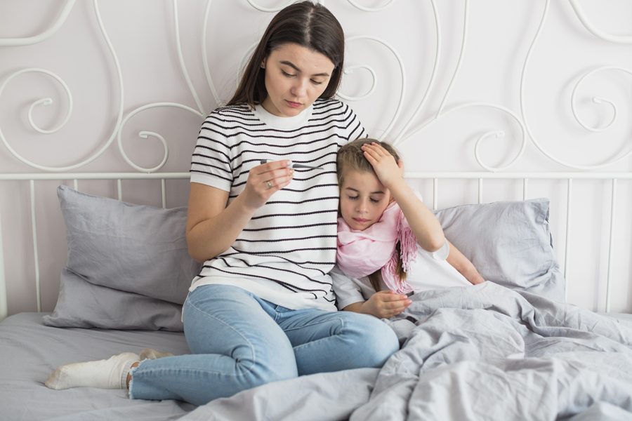 mother-taking-care-her-ill-daughter