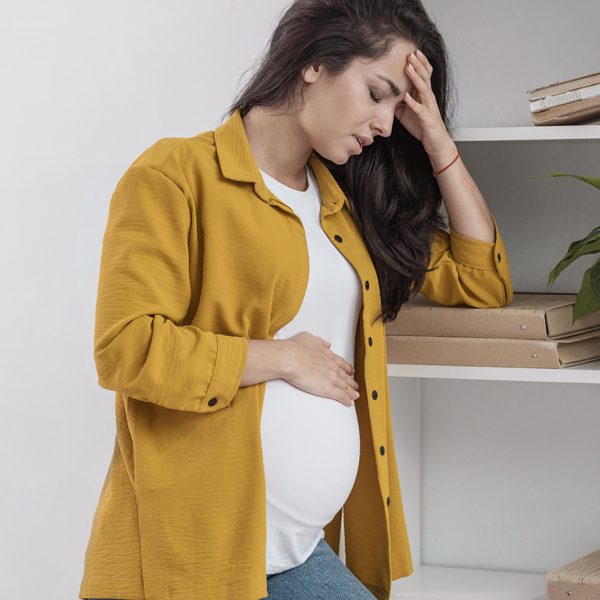 pregnant-woman-at-home-not-feeling-very-well