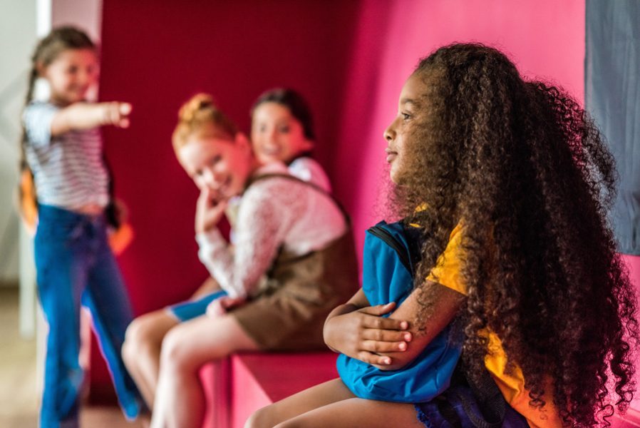 schoolgirls bullying on their african american classmate at school