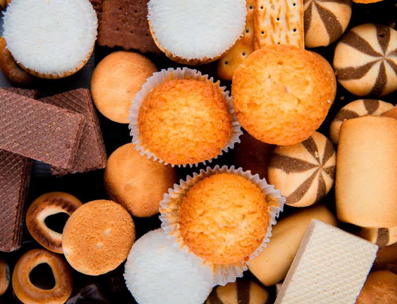 top view muffins with marshmallows a mix of cookies and chocolate waffles